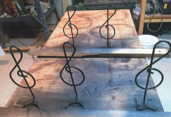 Custom metal guitar hangers
