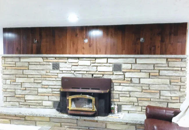 Finished custom woodworking on a fireplace 2020