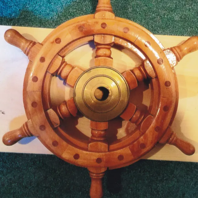 Pre-built ship wheel installed into headboard