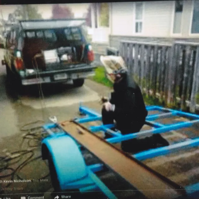 Welding a custom motorcycle trailer in Cobourg, 2020
