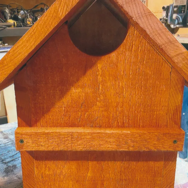Wooden owl house
