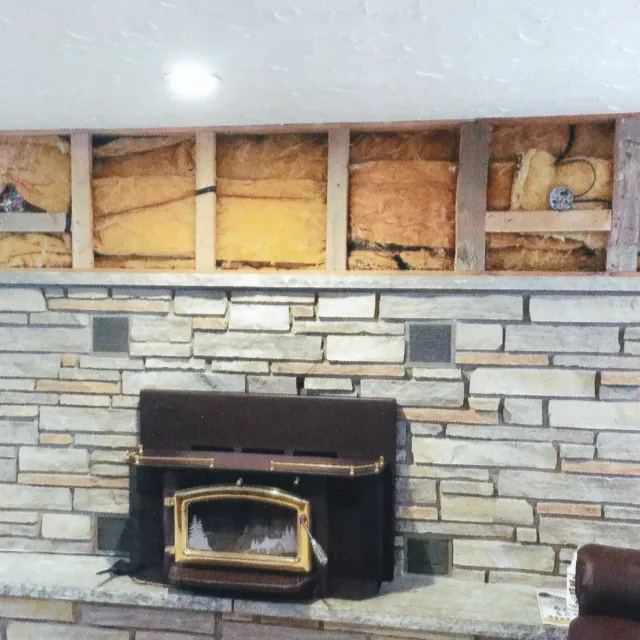 In progress custom woodworking on a fireplace